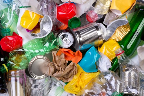 Waste clearance team removing household junk in East London