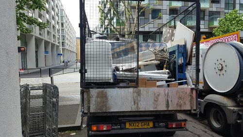 Construction site with waste clearance operations in East London