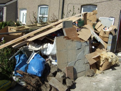 Clearing a room during house clearance in East London